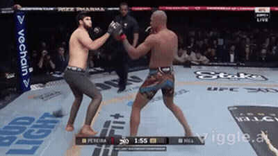 Two Men Are Fighting In A Boxing Ring With A Prize Pharma Banner Behind Them GIF