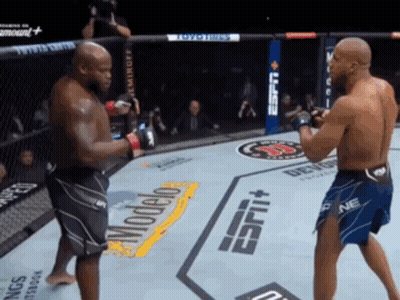 Two Men Are Fighting In A Boxing Ring With Espn On The Side Of The Ring GIF