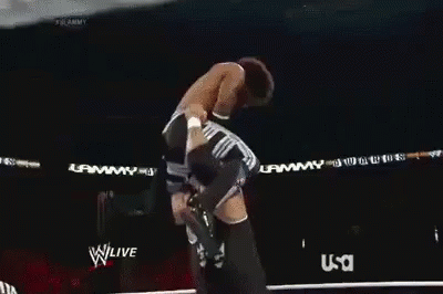 Two Men Are Fighting In A Boxing Ring With The Word Usa On The Bottom Of The Screen . GIF