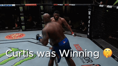 Two Men Are Fighting In A Boxing Ring With The Words Curtis Was Winning GIF