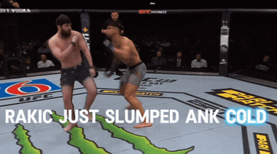 Two Men Are Fighting In A Boxing Ring With The Words Rakic Just Slumped Ank Cold On The Bottom GIF