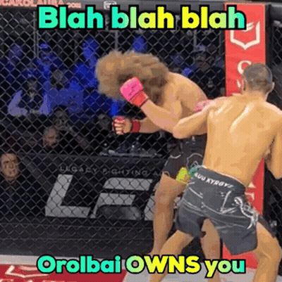 Two Men Are Fighting In A Cage With A Caption That Says Blah Blah Blah Oralbai Owns You GIF