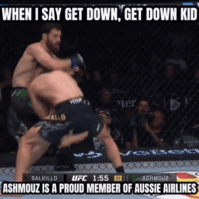 Two Men Are Fighting In A Cage With The Words When I Say Get Down Get Down Kid At The Top GIF