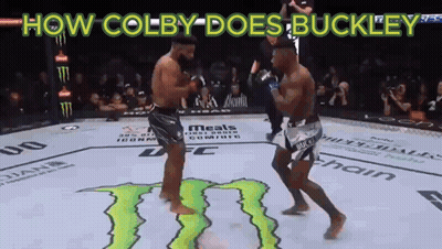 Two Men Are Fighting In A Ring With The Words How Colby Does Buckley GIF
