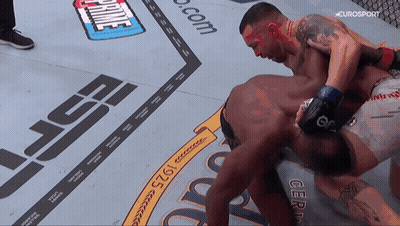 Two Men Are Fighting On A Boxing Ring With A Sign That Says Prime GIF
