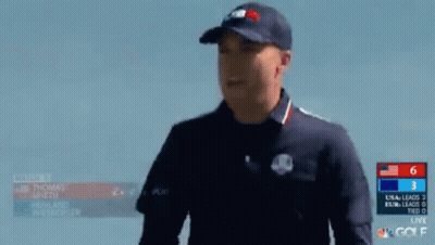 Two Men Are Giving Each Other A High Five During A Match GIF