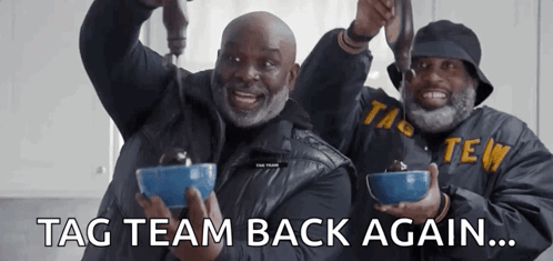 Two Men Are Holding Bowls In Their Hands With The Words Tag Team Back Again GIF