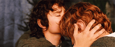 Two Men Are Kissing Each Other In A Movie Scene . GIF