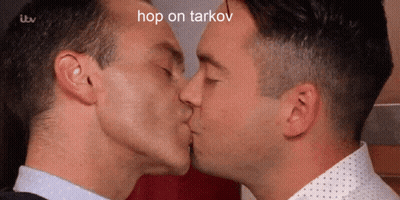 Two Men Are Kissing With The Caption Hop On Tarkov GIF