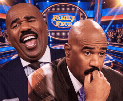 Two Men Are Laughing In Front Of A Family Feud Logo GIF