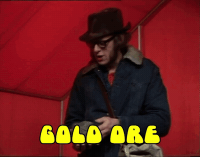 Two Men Are Laying On A Bed With The Words Ore Written In Yellow GIF