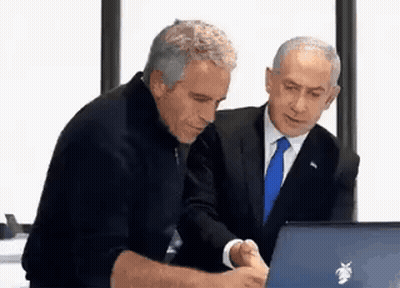 Two Men Are Looking At A Laptop Computer Together . GIF