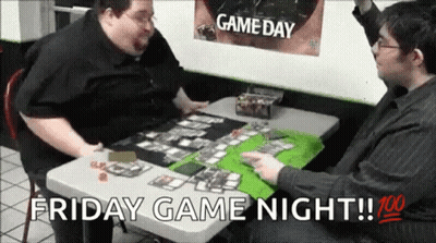 Two Men Are Playing A Game Of Cards At A Table With The Words Friday Game Night . GIF