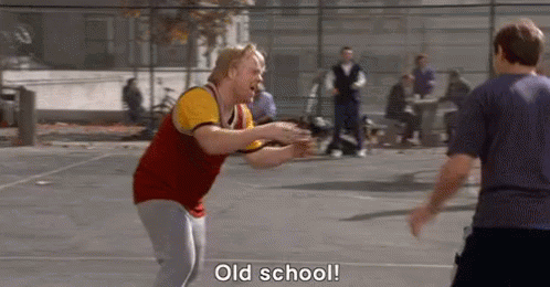 Two Men Are Playing Basketball On A Court And One Of Them Is Shouting . GIF