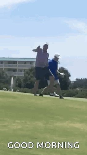 Two Men Are Playing Golf On A Golf Course And One Of Them Is Giving A Thumbs Up . GIF