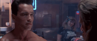 Two Men Are Playing Pool In A Bar With A Bud Light Sign GIF
