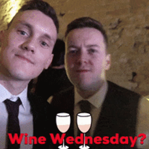 Two Men Are Posing For A Picture With The Words Wine Wednesday Behind Them GIF