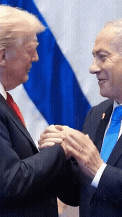Two Men Are Shaking Hands In Front Of A Flag GIF