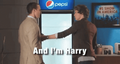 Two Men Are Shaking Hands In Front Of A Pepsi Refrigerator GIF
