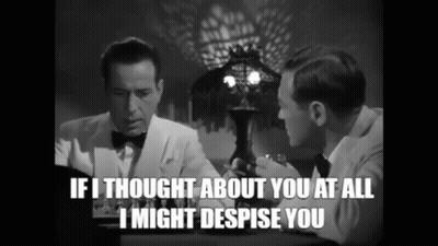 Two Men Are Sitting At A Table And One Of Them Is Saying If I Thought About You At All I Might Despise You GIF