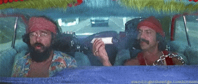 Two Men Are Sitting In A Car And One Has A Beard GIF