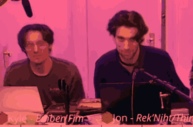 Two Men Are Sitting In Front Of A Microphone And Their Names Are Kyle And Ebnerfim GIF