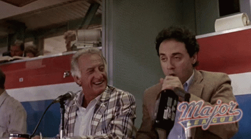 Two Men Are Sitting In Front Of Microphones With The Word Majors League On The Bottom Right GIF
