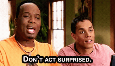 Two Men Are Sitting Next To Each Other And One Of Them Says " Don 'T Act Surprised " GIF