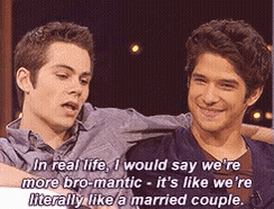 Two Men Are Sitting Next To Each Other And One Of Them Says In Real Life GIF