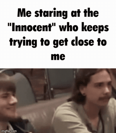 Two Men Are Sitting Next To Each Other In A Car And One Of Them Is Trying To Get Close To The Other . GIF