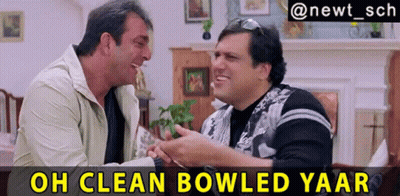 Two Men Are Sitting Next To Each Other In A Living Room With The Caption Oh Clean Bowled Yaar Above Them GIF