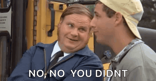 Two Men Are Sitting Next To Each Other In Front Of A School Bus . GIF