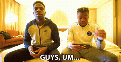 Two Men Are Sitting On A Bed And One Of Them Says " Guys Um ... " GIF