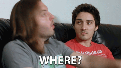 Two Men Are Sitting On A Couch And One Of Them Is Wearing A Shirt That Says Millennium Free GIF