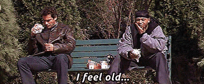 Two Men Are Sitting On A Park Bench And One Of Them Is Saying " I Feel Old " GIF