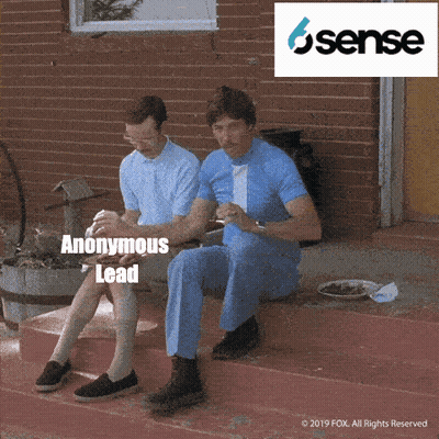 Two Men Are Sitting On A Porch With Anonymous Lead Written In The Corner GIF