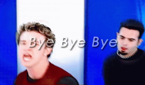 Two Men Are Standing In Front Of A Blue Wall With The Words Bye Bye Bye Written On It GIF