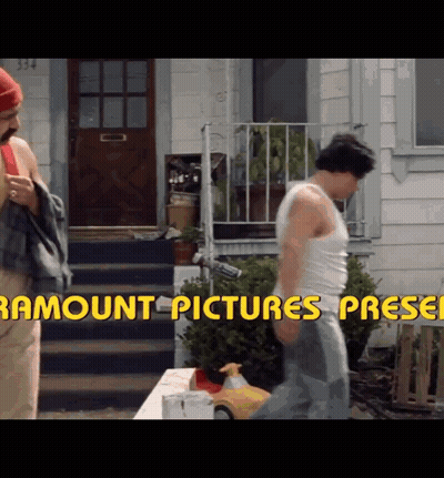 Two Men Are Standing In Front Of A House With The Words Paramount Pictures Pressed GIF