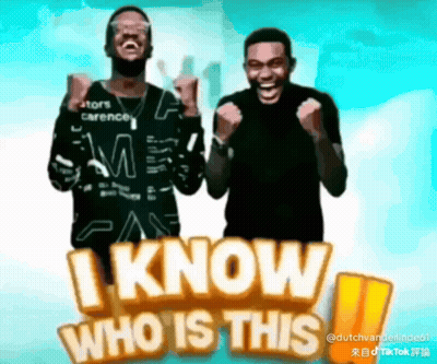 Two Men Are Standing In Front Of A Sign That Says I Know Who Is This .. GIF