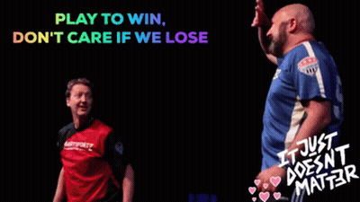 Two Men Are Standing In Front Of A Sign That Says Play To Win Don T Care If We Lose It Just Does N't Matter GIF