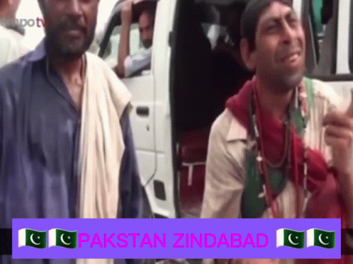 Two Men Are Standing In Front Of A White Van With The Words Pakistan Zindabad On The Bottom Right GIF