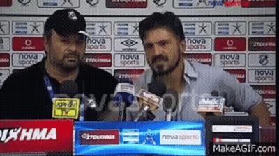Two Men Are Standing In Front Of Microphones And A Sign That Says Nova Sports GIF