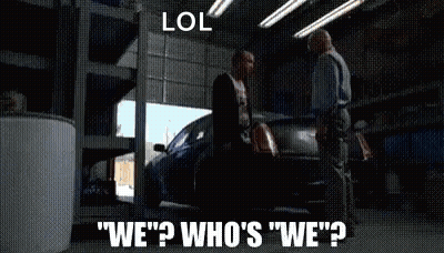 Two Men Are Standing Next To A Car In A Garage And One Of Them Is Asking The Other " Who 'S We " GIF