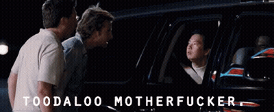Two Men Are Standing Next To A Car With The Words " Toodaloo Motherfucker " Written On The Bottom GIF