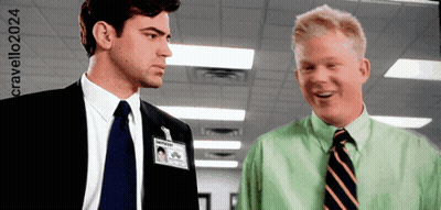 Two Men Are Standing Next To Each Other And One Has A Name Tag That Says Nathan On It GIF