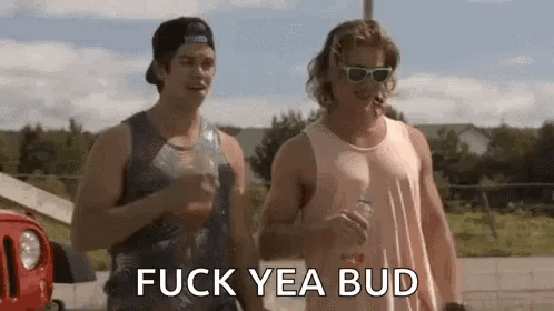 Two Men Are Standing Next To Each Other And One Is Smoking A Cigarette . GIF