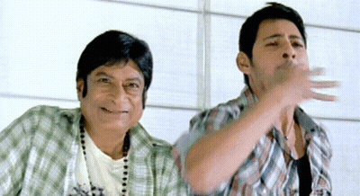Two Men Are Standing Next To Each Other And One Is Wearing A Shirt That Says ' X ' On It GIF