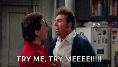 Two Men Are Standing Next To Each Other And One Of Them Is Saying Try Me Try Meeeee GIF