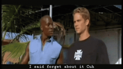 Two Men Are Standing Next To Each Other And One Of Them Is Wearing A Shirt That Says I Said Forget About It Cuh GIF