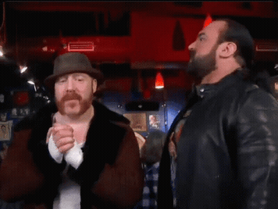 Two Men Are Standing Next To Each Other And The Word Banger Is On The Bottom GIF